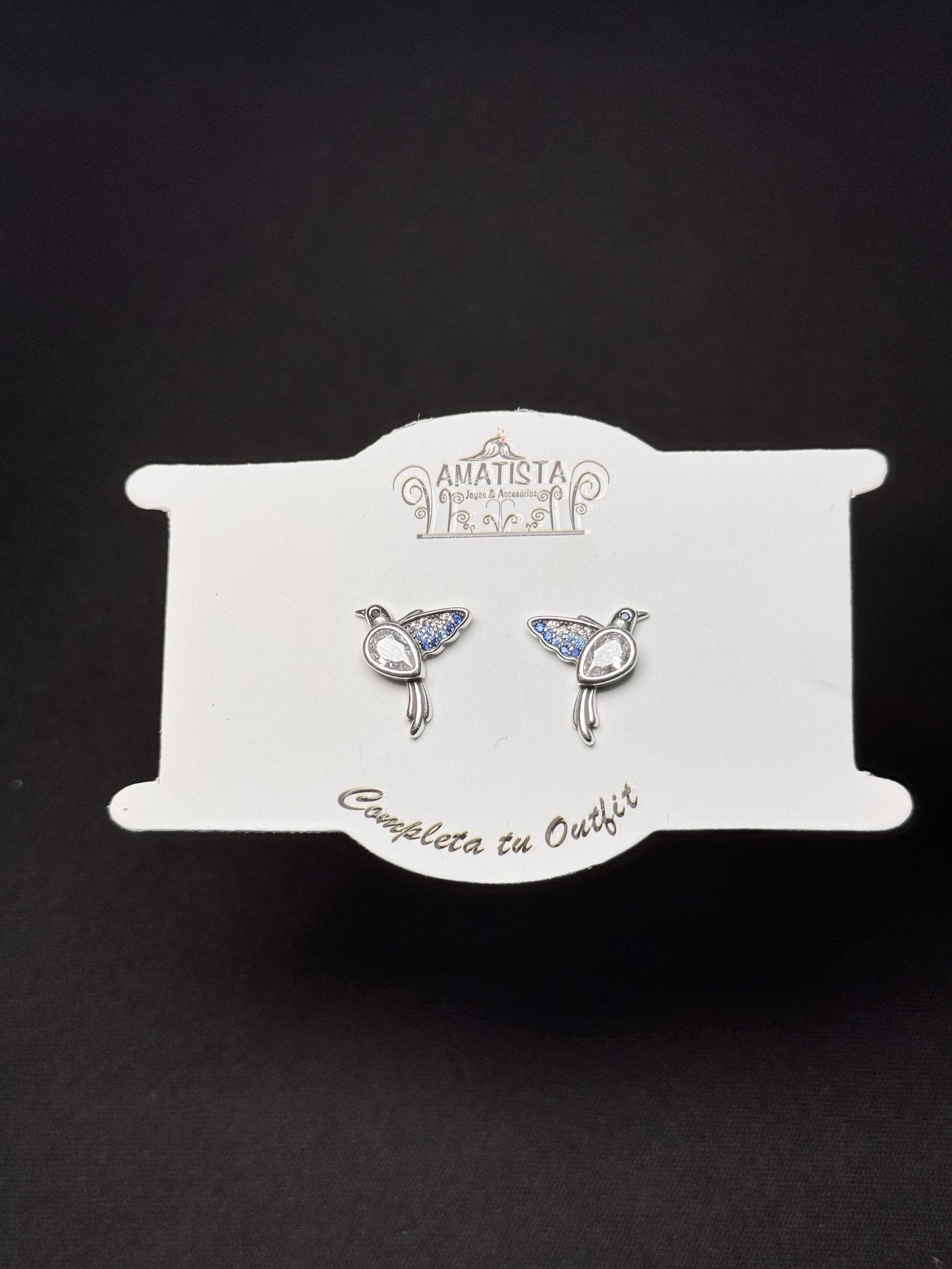 Topo pájaro plateado