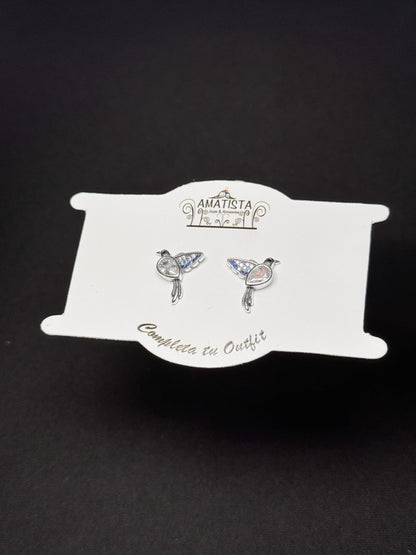 Topo pájaro plateado