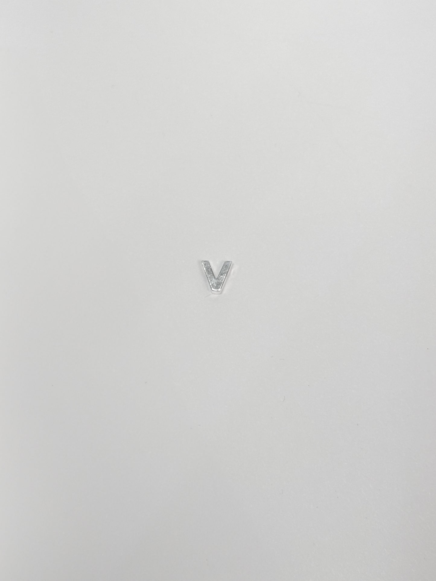 Cadena con inicial con dije pasante