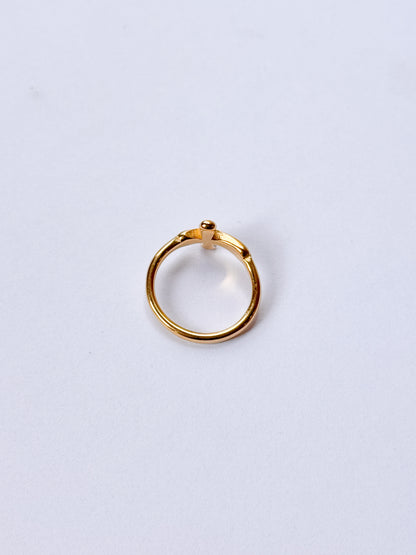 Anillo cruz dorada
