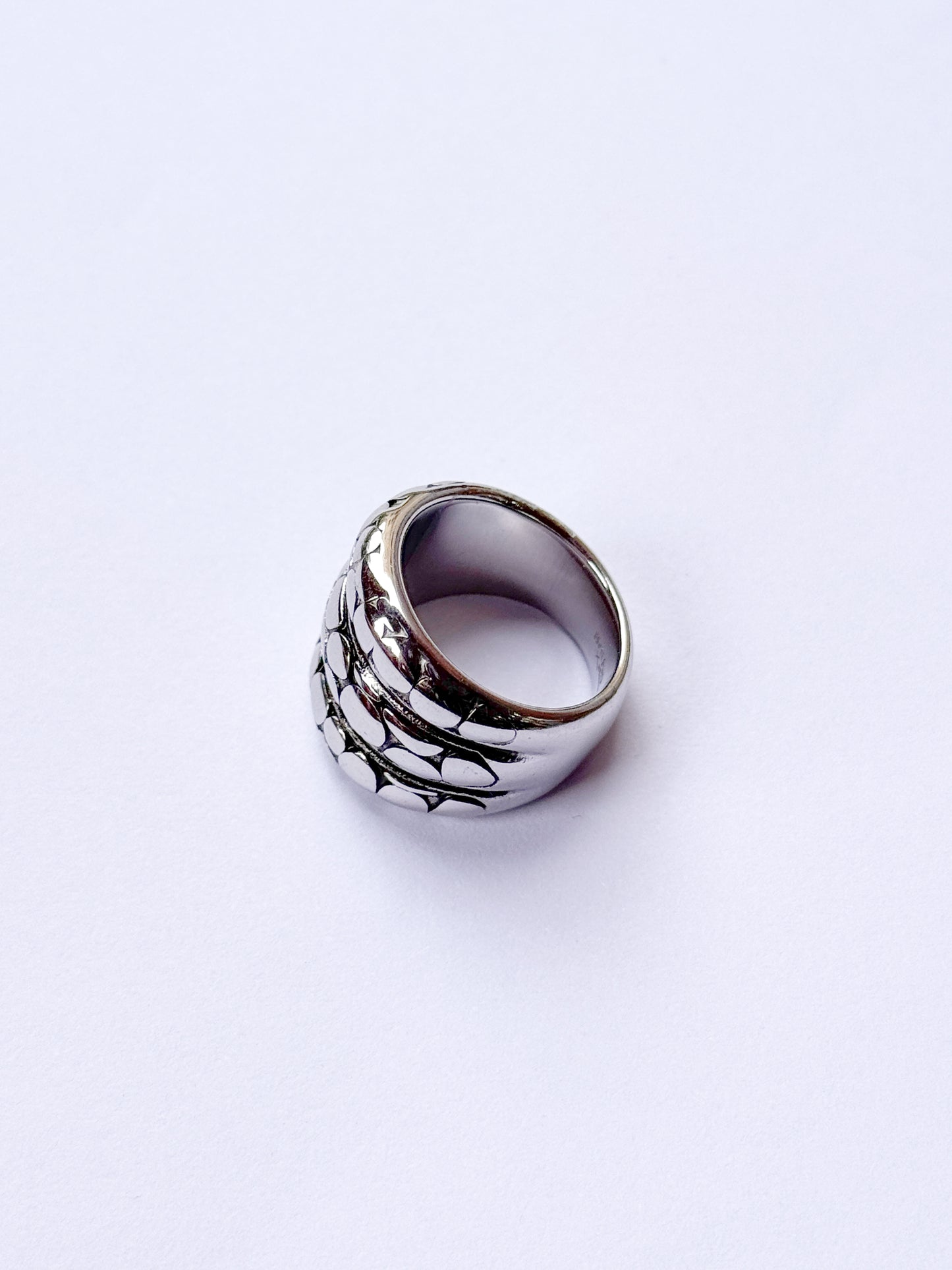 Anillo orbitas plateadas